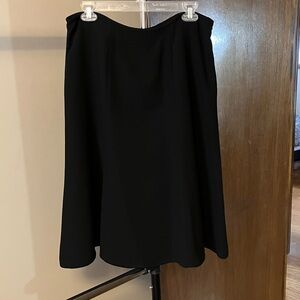 Like new, women’s black skirt. Smoke free; pet free home.